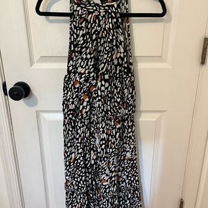 Chic Black and White Patterned Dress with Orange Accents